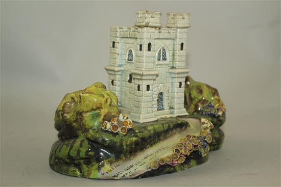 A rare Staffordshire pearlware model of a castle tower or hunting lodge, c.1820, 13.5cm